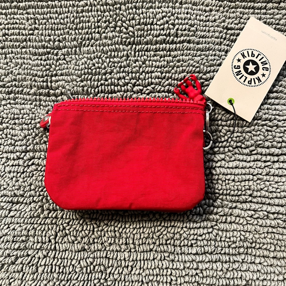 Kipling Creativity Small Red Mini Pouch - NWT
Color: Red Rouge - Picture 2 of 4